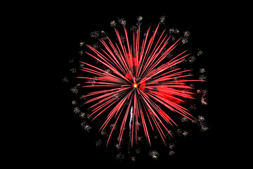 Colorful fireworks of various colors on black background