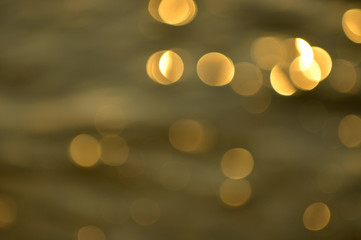 Defocused Of Water surface with waves glittering in the sun.