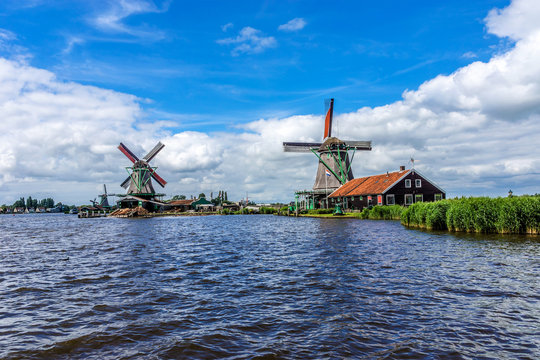 Traditional Dutch old wooden windmill. Zaanse Schans, Zaandam.