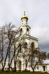 Fototapeta na wymiar View of the bell tower of the Yuriev monastery in Veliky Novgoro