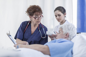 Doctor explaining patient advance directive