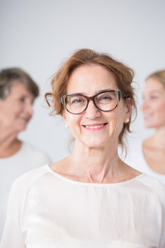Smiling mature woman in glasses