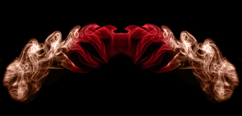 Red wings of smoke