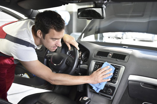 Car cleaning, man cleaning car, vehicle interior