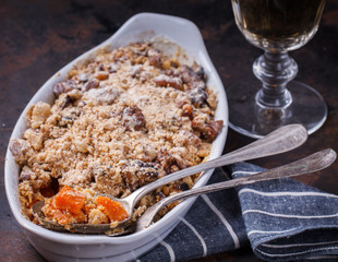 Crumble pumpkin.Appetizer. glass of white wine.selective focus