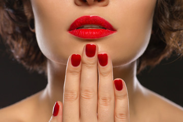 Fototapeta premium Young attractive lady upholding one hand.