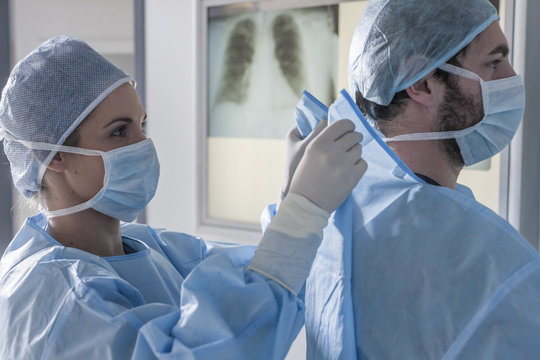 Two surgeons preparing for operation