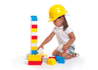 Cute little girl portrait playing with blocks