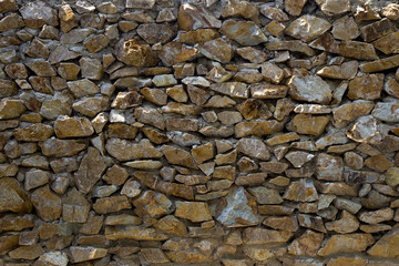 pattern brown color of modern style design decorative uneven cracked real stone wall surface with cement