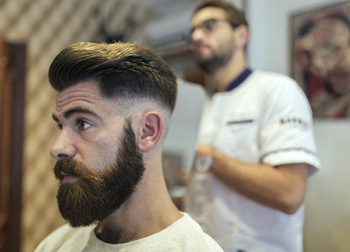 Barber and customer in a barber shop