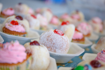 Donut and cup cake on table