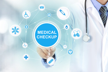 Doctor hand touching MEDICAL CHECKUP sign on virtual screen