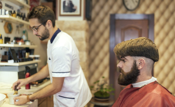 Barber and customer in a barber shop