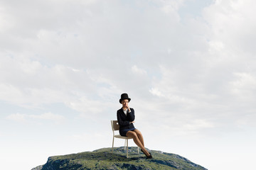 Girl in black cylinder