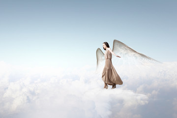 Angel girl flying high