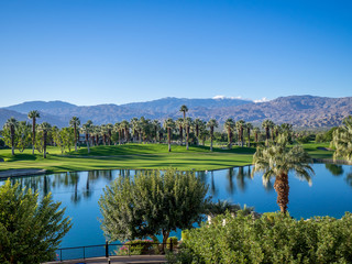 Naklejka na ściany i meble Golf course and water feature in Palm Desert California. 