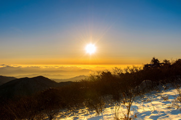 Sunrise with beautiful Lens Flare at Deogyusan mountains in wint