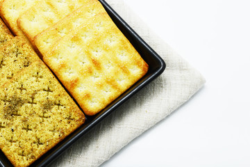 cracker and cookie on white background