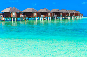  beach with water bungalows Maldives
