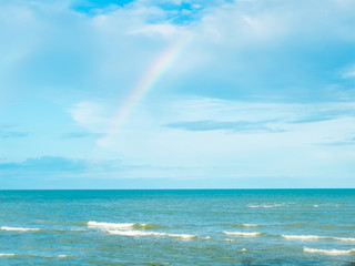 Blue Sea and Sky in Thailand with Rainbow after Raining