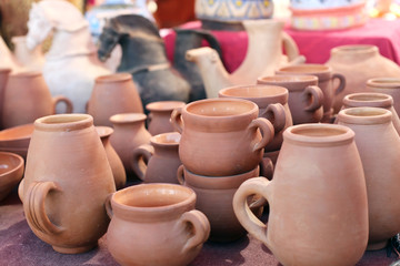 Fototapeta na wymiar Ceramic tableware is handmade on the counter
