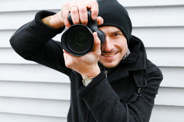 Photographer on walk with a professional camera