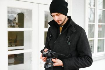 Photographer on walk with a professional camera