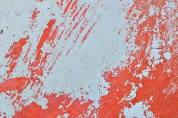 Old crack red paint on metal texture background.