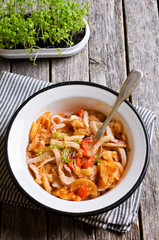 Pasta with squid and vegetables