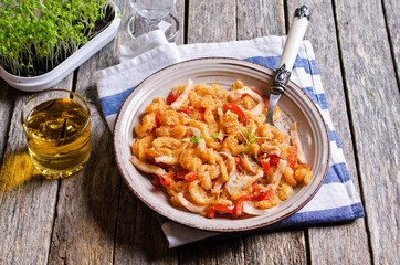 Pasta with squid and vegetables