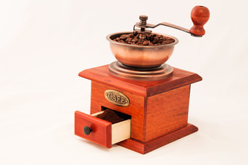 Retro coffee mill on white backgrownd