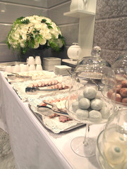 pastry buffet with line of bakery
