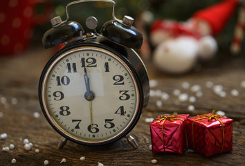 Fototapeta na wymiar Vintage clock on christmas background