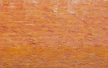Pattern of brick roof on top of Thai temple in Phrae province