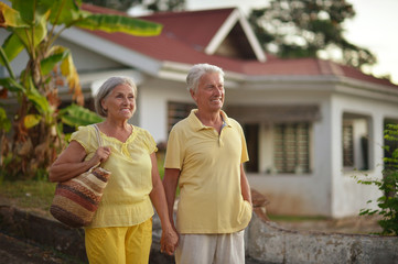 Senior couple near hotel resort