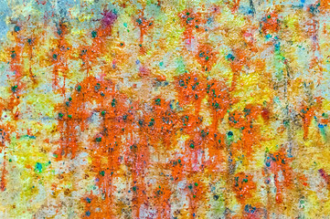 paintball ammunition splashes on the concrete wall