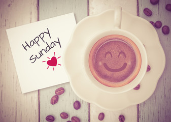 Happy Sunday with coffee cup on table