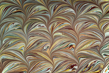 Ebru art. Traditional Turkish Ebru technique. Painting on water, followed by paper prints. Color paint ebru with waves and tile pattern.