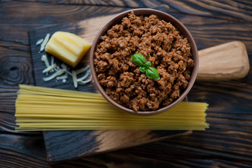 Top view of ingredients for making spaghetti bolognese, close-up