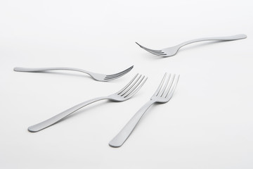 Silver fork on white background