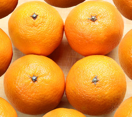 Ripe mandarin  over wooden table background