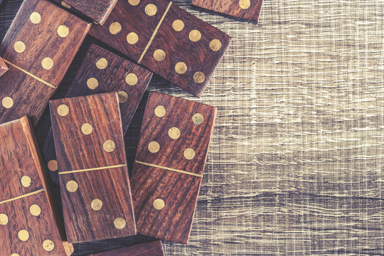 Dominoes On A Wooden Table