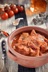Tripe soup with tomatoes. Selective focus.