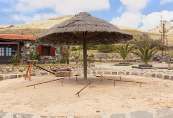 Rural  courtyard with device for threshing grain. Portugal.