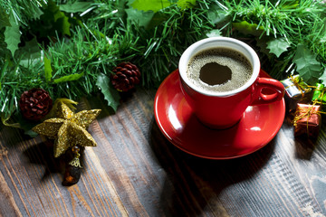 Cup of coffee with Christmas decorations.