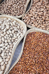 Straw baskets filled with various kinds of nuts