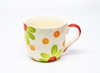 Close up of a beautiful cup on white background.