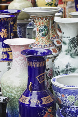 Collection of ornate vases on a Chinese market