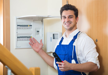 Electrician fixing problems of automatic electric meter