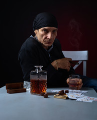 man with whiskey and cigar